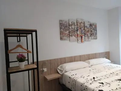 Cama o camas de una habitación en Welcoming Apart Old Town