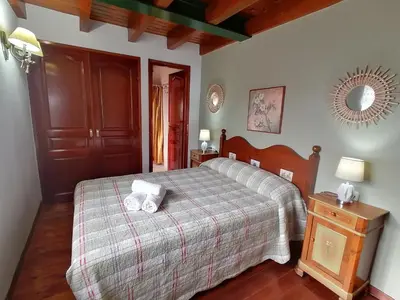 Cama o camas de una habitación en casa rural Dera Hont