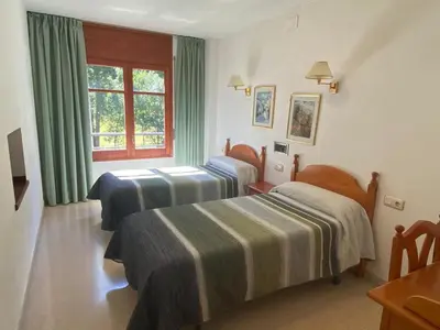 Cama o camas de una habitación en Hotel Puitavaca