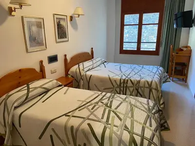 Cama o camas de una habitación en Hotel Puitavaca