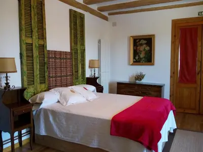 Cama o camas de una habitación en La Casona de Pitillas