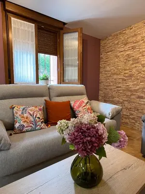 Zona de estar de Apartamentos La Flor