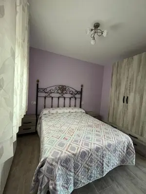 Cama o camas de una habitación en Apartamentos La Flor