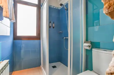 Un baño de Fonda La Grancha