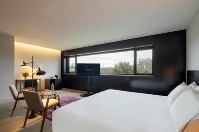 Cama o camas de una habitación en Eurostars Pamplona
