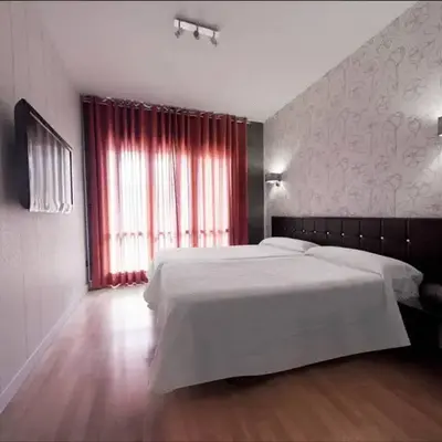 Hospedium Hostal Un Punto Chic