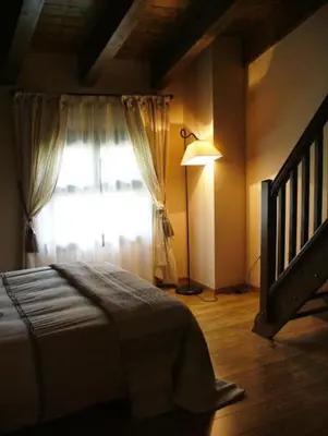 Cama o camas de una habitación en Hotel Areulo