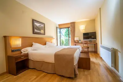Cama o camas de una habitación en Hotel & Restaurante Peña