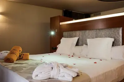 Cama o camas de una habitación en Hotel Sancho Abarca Petit SPA