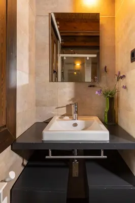 Un baño de Apartamentos Casa Roldan I