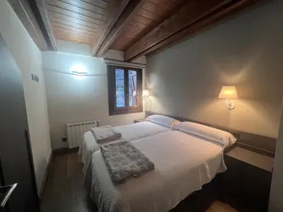 Cama o camas de una habitación en Apartamentos Casa Roldan I