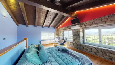 Zona de estar de Casa Rural La Abadia-Apartamentos