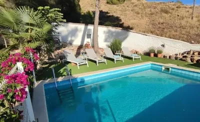 Piscina en o cerca de Villa Pachita (por habitaciones)