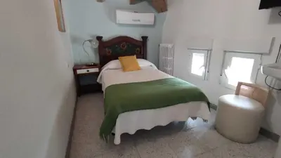 Cama o camas de una habitación en Villa Pachita (por habitaciones)