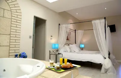Cama o camas de una habitación en Hotel Castillo Bonavía