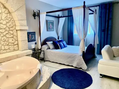 Cama o camas de una habitación en Hotel Castillo Bonavía