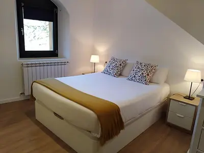 Cama o camas de una habitación en Ca de Géraldine