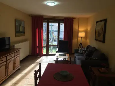 Zona de estar de apartamentos turisticos san juan de la peña