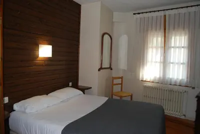 Cama o camas de una habitación en Pension Casa Vicenta