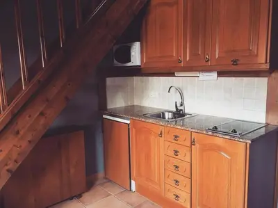 Una cocina o zona de cocina en Aparthotel Es de Don Joan