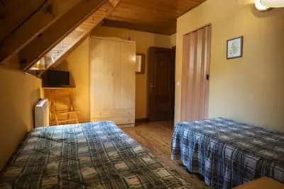 Cama o camas de una habitación en Fonda Eth Petit - Sólo adultos,niños a partir de 12 años