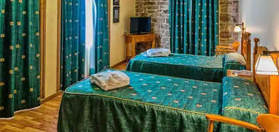 Cama o camas de una habitación en Hotel Balneari de Vallfogona de Riucorb