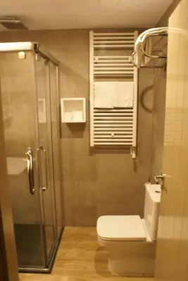 Un baño de Apartamentos Casa Roldan