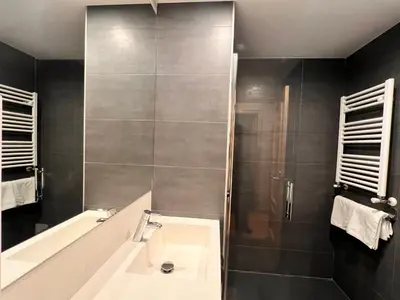 Un baño de Apartamentos Casa Roldan