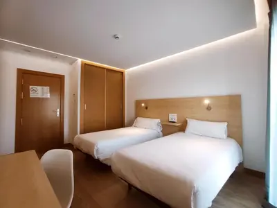 Cama o camas de una habitación en Hotel Casa Marzo