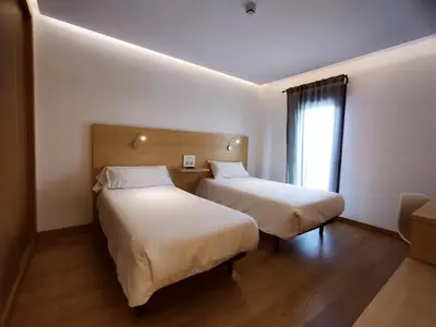 Cama o camas de una habitación en Hotel Casa Marzo