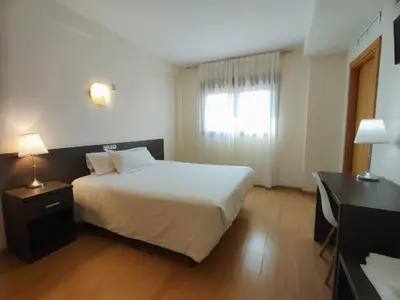 Cama o camas de una habitación en Hotel Casa Marzo