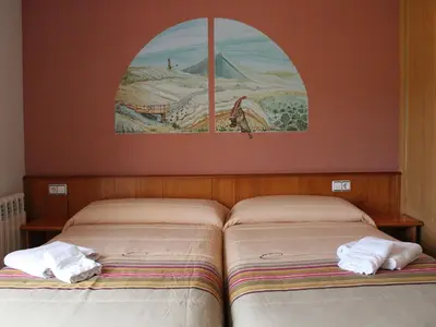 Cama o camas de una habitación en Hotel Casa Domenc