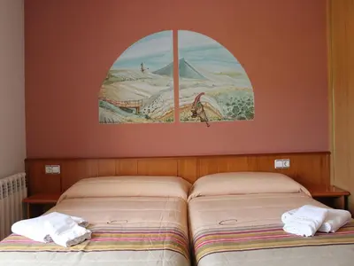 Cama o camas de una habitación en Hotel Casa Domenc