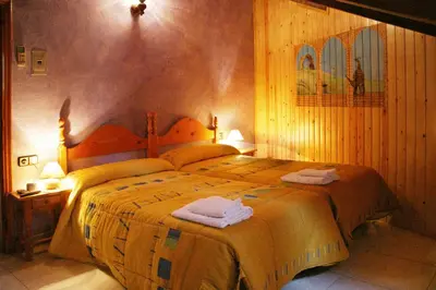 Cama o camas de una habitación en Hotel Casa Domenc