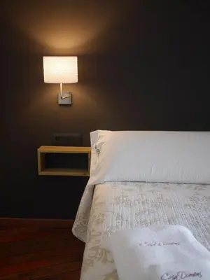 Cama o camas de una habitación en Hotel Casa Domenc