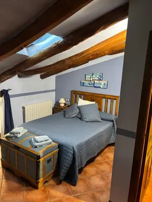 Cama o camas de una habitación en Hotel Casa de la Fuente