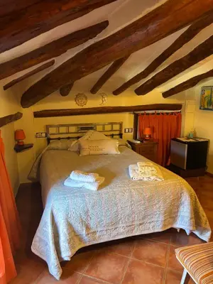 Cama o camas de una habitación en Hotel Casa de la Fuente
