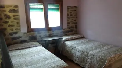 Cama o camas de una habitación en La Casa Azul