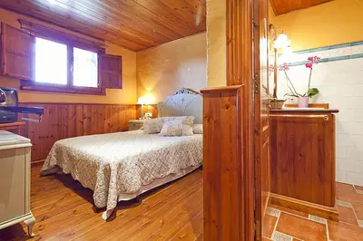 Cama o camas de una habitación en Baqueira 1700 pie de pistas Tanau 4 hab