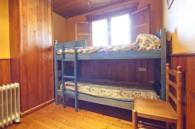 Cama o camas de una habitación en Baqueira 1700 pie de pistas Tanau 4 hab