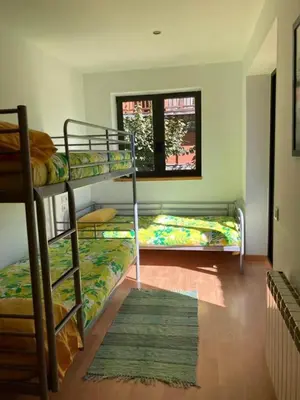 Cama o camas de una habitación en Apartamentos Bonaigua TG