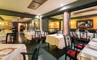 Un restaurante o sitio para comer en El Patio