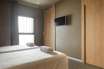 Cama o camas de una habitación en Hotel Landaben