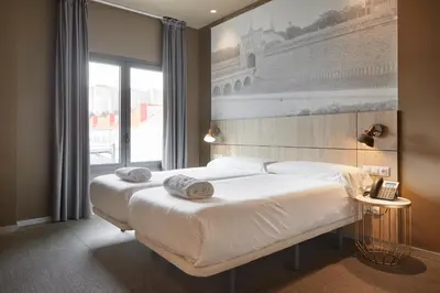Cama o camas de una habitación en Hotel Landaben
