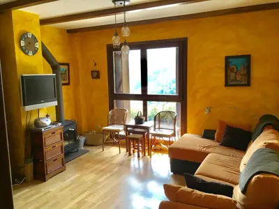 Una televisión o centro de entretenimiento en Mi rincón en Gavín