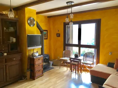 Una televisión o centro de entretenimiento en Mi rincón en Gavín