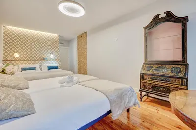 Cama o camas de una habitación en Heart of Pamplona Apartments IV by clabao