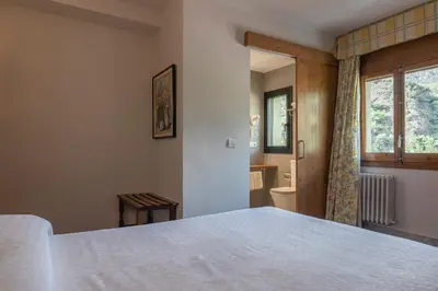 Cama o camas de una habitación en Hotel Cardós