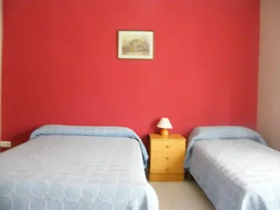 Cama o camas de una habitación en Pensión Corona