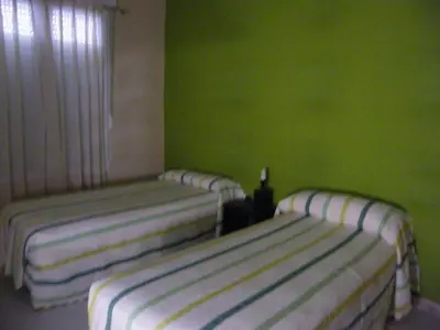 Cama o camas de una habitación en Pensión Corona